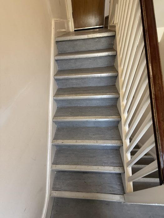 Commercial staircase after a detailed Kirei Clean service.