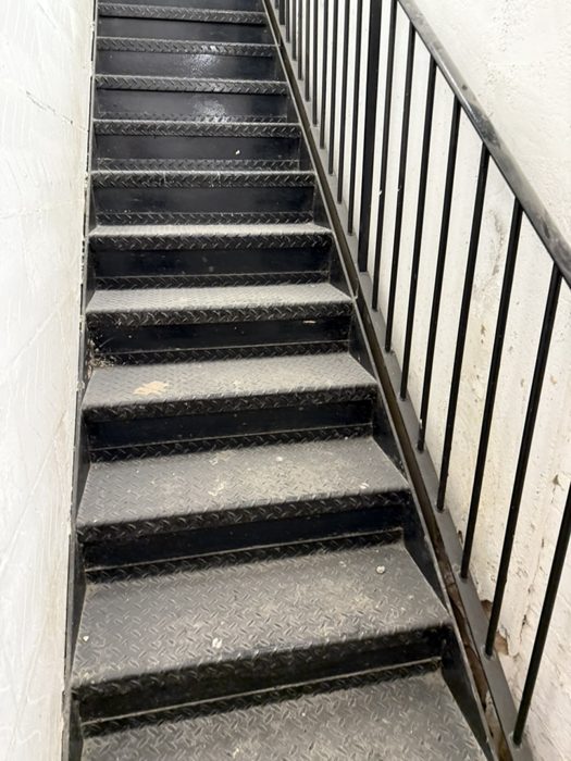 Commercial staircase before a detailed clean.