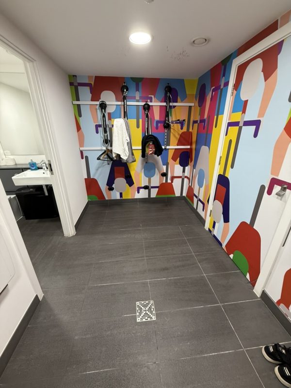 Freshly cleaned gym changing area and tiled floor.